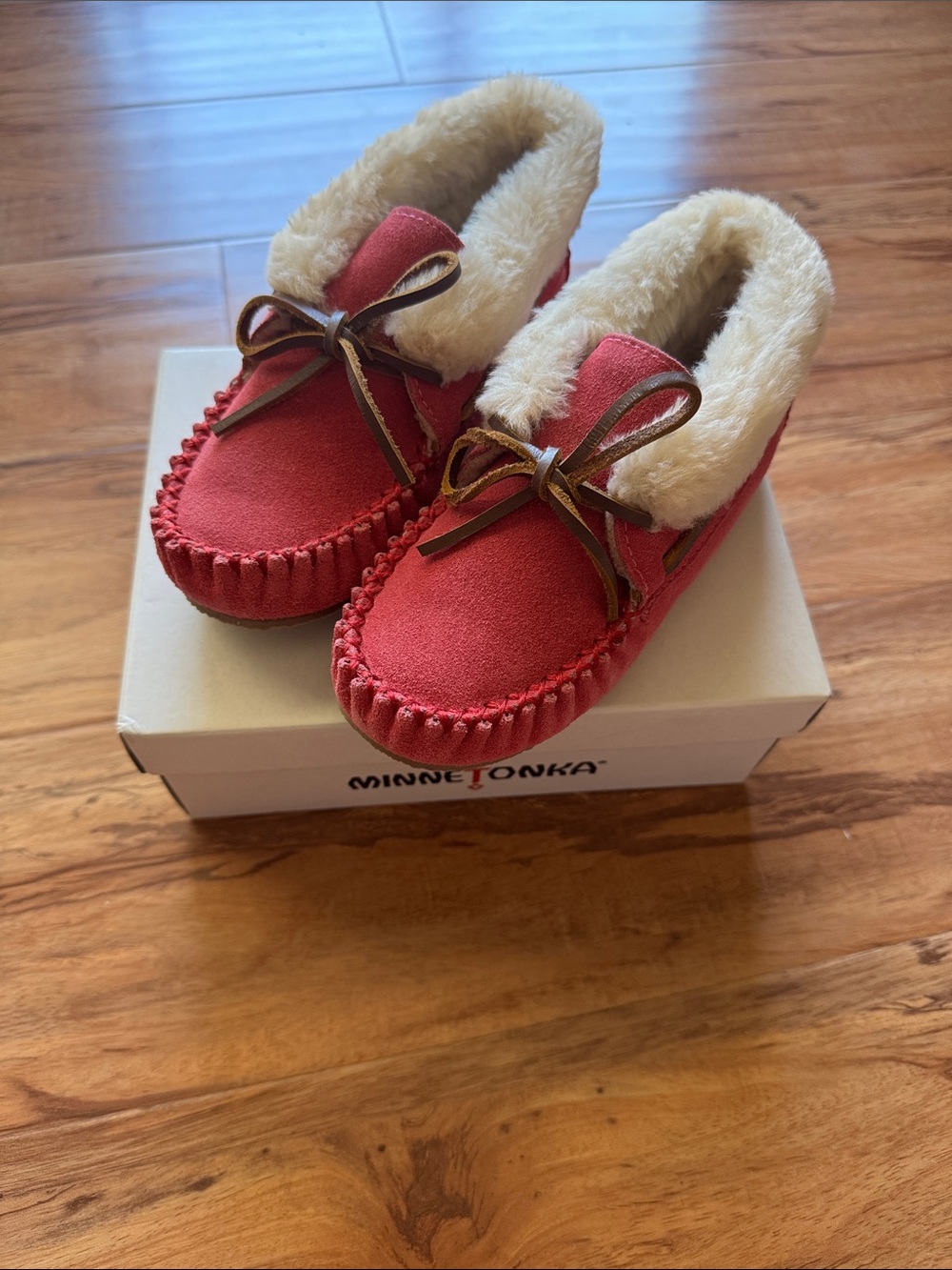Minnetonka Pink Suede Moccasins with Cream Faux Fur Trim for Kids